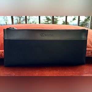 Vintage CK Slim Zippered Pouch with Leather Trim
New with Tag/Never Used
Unisex